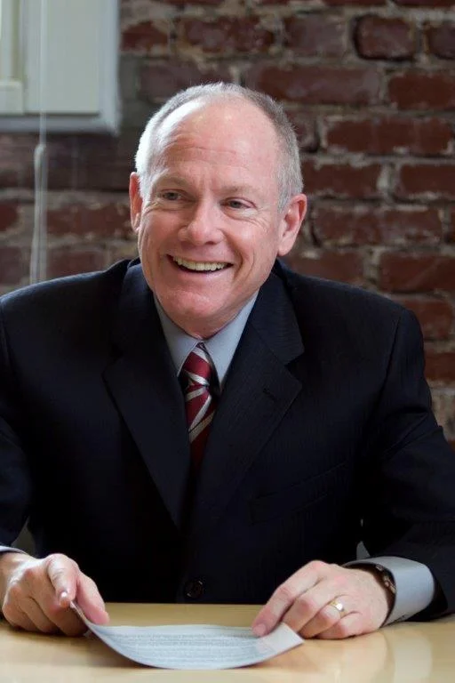 Happy chairman headshot image